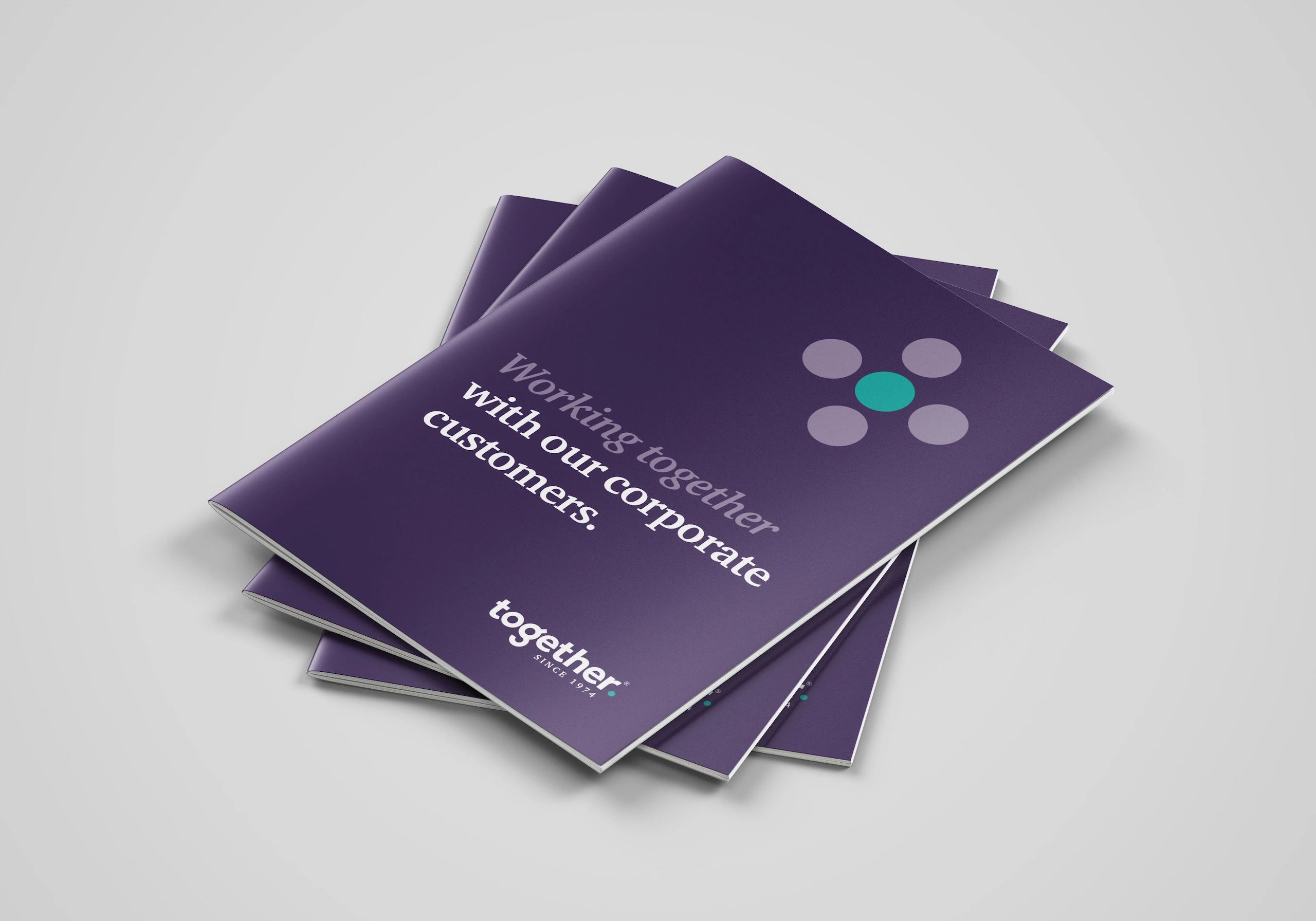 A pile of three corporate brochures from a Financial lender company. Brochure design by Gavin Stretch of Mode=Create.